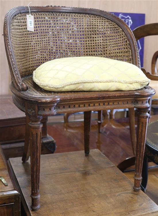 A French carved tub chair